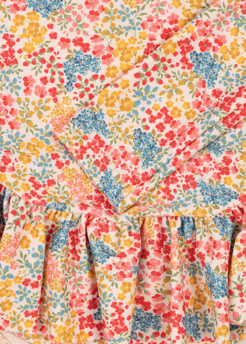 Konges Sløjd badpak meisje Municci LS Swimsuit GRS Fio Cala kleuren bloemenprint